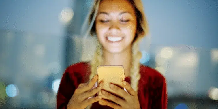 Woman holding smartphone